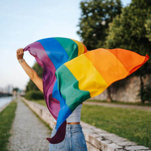 Love Is Love Girl With Pride Flag Wallpaper