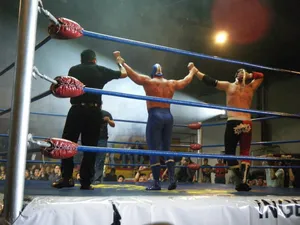 Lucha Libre Victory Celebration Wallpaper