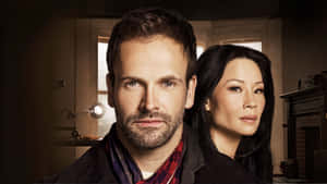 Lucy Liu And Johnny Lee Miller Wallpaper