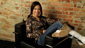 Lucy Liu In Her Signature Sunglasses Wallpaper