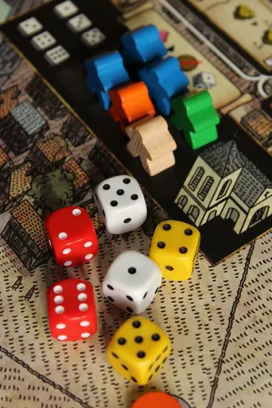 Ludo King Colorful Dice And Figurines Wallpaper