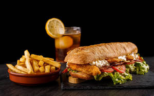 Lunch With Submarine Sandwich And Fries Wallpaper