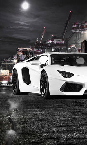 Luxurious Lifestyle - White Lamborghini Paired With An Iphone Wallpaper