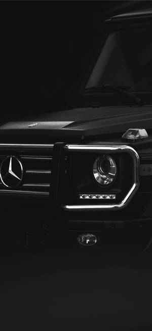 Luxurious Mercedes Benz Car Highlighting Sophisticated Headlight Wallpaper