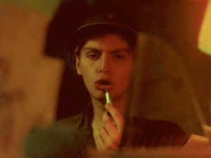 Mac_ De Marco_ Applying_ Lip_ Balm Wallpaper