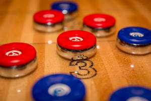 Macro Shot Red Puck Shuffleboard Wallpaper