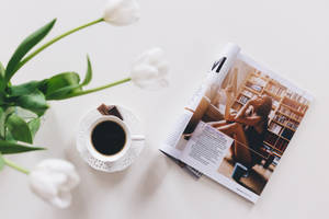 Magazine Beside Coffee And Flower Wallpaper