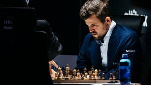 Magnus Carlsen In A Chess Match Wallpaper