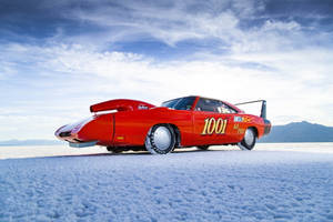 Majestic 1969 Dodge Charger Confronting The Winter Season. Wallpaper