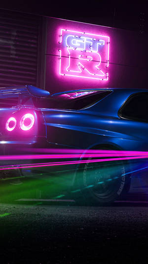 Majestic 4k Car Illuminated By Neon Lights On Iphone Wallpaper Wallpaper