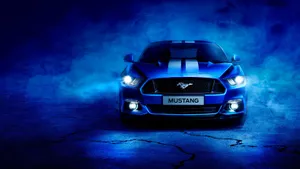 Majestic Blue Ford Mustang Enveloped In Fog Wallpaper
