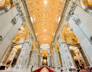 Majestic Interior Of St. Peter's Basilica In Vatican City Wallpaper