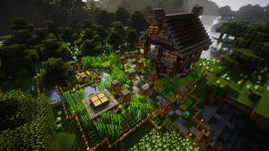Majestic Minecraft House Surrounded By Lush Garden Wallpaper