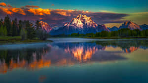 Majestic Mountain Scenery In The Background Wallpaper