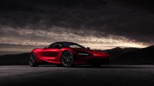 Majestic Red Mclaren 720s Glowing In The Night Wallpaper