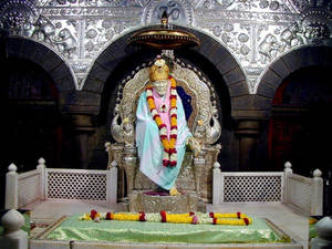 Majestic Sai Baba Statue In A Mosque In 4k Quality Wallpaper