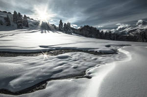 Majestic Swiss Alps Blanketed In Snow Wallpaper