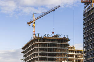 Majestic Tower Crane In Hd At Engineering Construction Site Wallpaper