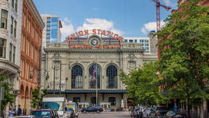 Majestic Union Station Exterior Amidst Greenery Wallpaper