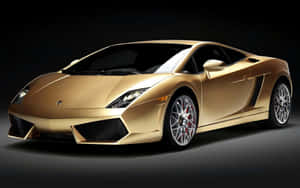 Make A Statement With The Dazzling Gold Lamborghini Wallpaper