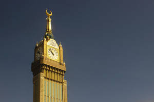 Makkah Madina Clock Tower Golden Wallpaper