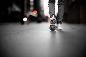 Male Feet Walking In A Gentle Stride Wallpaper