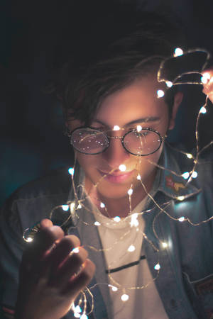 Male Pose Lights And Glasses Wallpaper