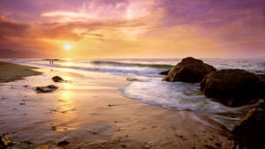 Malibu Beach Rock Formations During Sunset Wallpaper