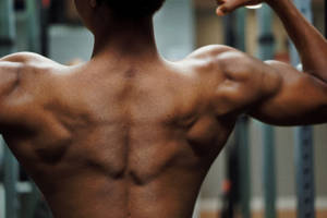 Man Flex Biceps Gym Wallpaper