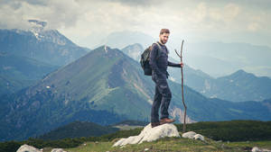 Man Hiking In Slovenia Wallpaper
