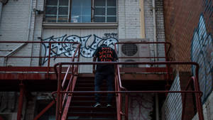 Man On Stairs Anti Social Wallpaper