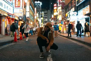 Man Sitting Night City Wallpaper