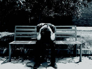 Man So Sad On Bench Wallpaper
