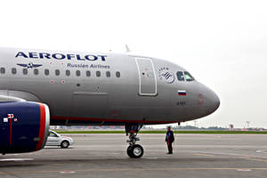 Man Standing Aeroflot Wallpaper