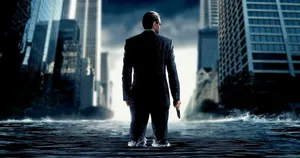 Man_ Standing_ Amidst_ Flooded_ Cityscape Wallpaper