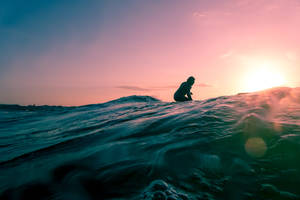 Man Surfing In Cool Water Wallpaper