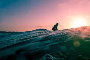 Man Surfing In Cool Water Wallpaper