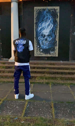 Man Viewing Skull Graffiti Art Wallpaper