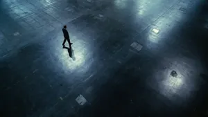 Man Walking On Empty Lot Wallpaper