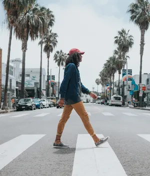 Man Walking The Street Wallpaper