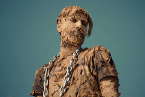 Man With Mud Photoshoot Wallpaper