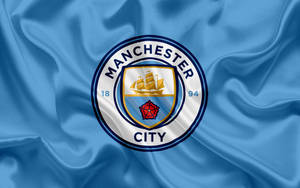 Manchester City 4k Blue Silk Flag Wallpaper