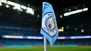 Manchester City 4k Flag On Pole Wallpaper