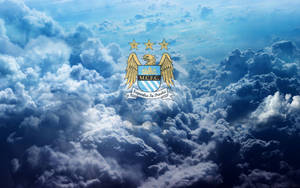 Manchester City Logo Above The Clouds Wallpaper