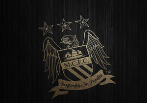 Manchester City Logo With Motto Wallpaper