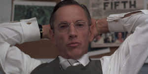 Manin Glasses Leaning Back Wallpaper