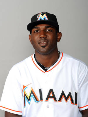 Marcell Ozuna In White Backdrop Wallpaper