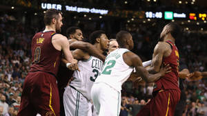 Marcus Smart And Jr Smith Squabbling Wallpaper