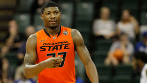 Marcus Smart Wears Orange Jersey Wallpaper
