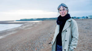 Margaret Howell Enjoying The Serene Beach Wallpaper